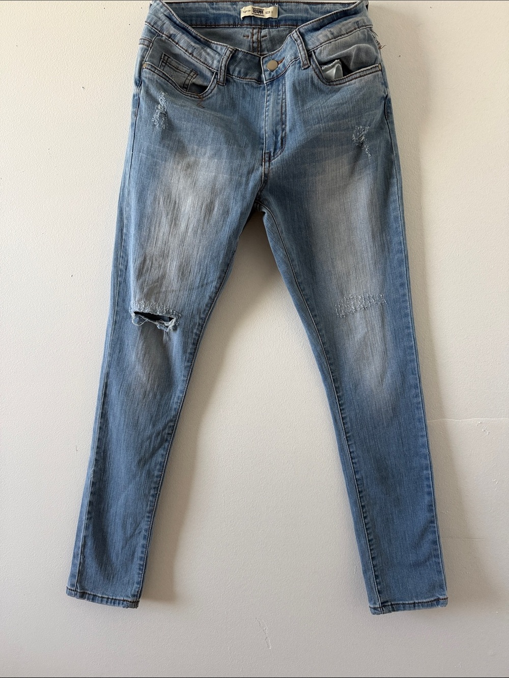 Women Light Wash Skinny Jeans with Subtle Distressing size 11